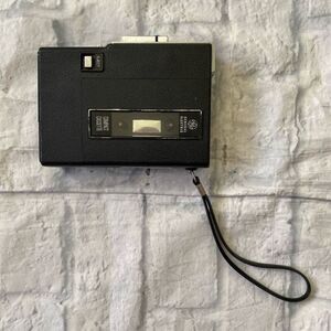 General Electric Vintage 1980s compact Cassette tape player black w/wrist strap